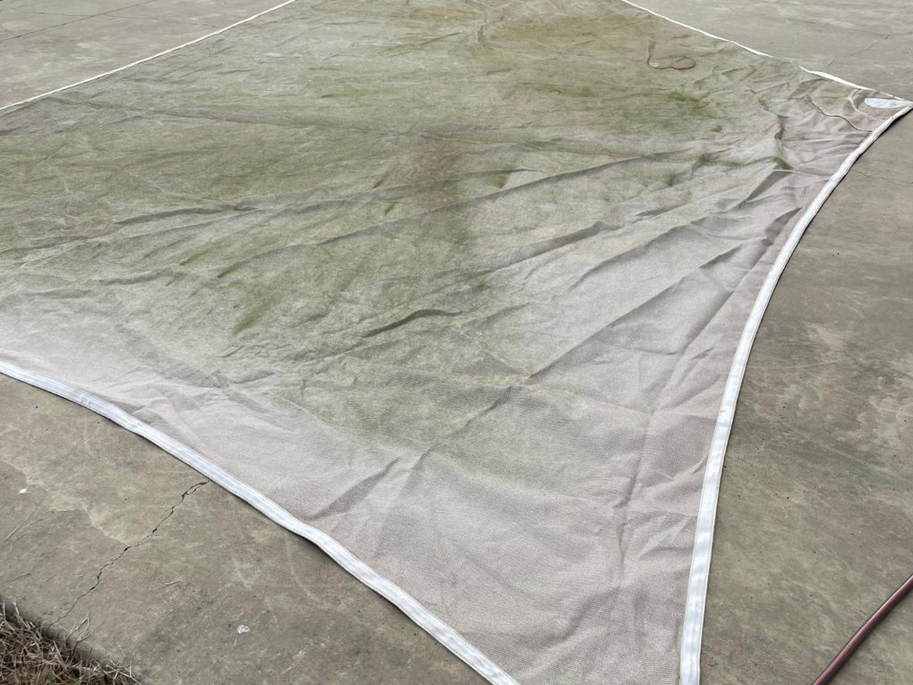 Shade sail before cleaning by Pristine Washing
