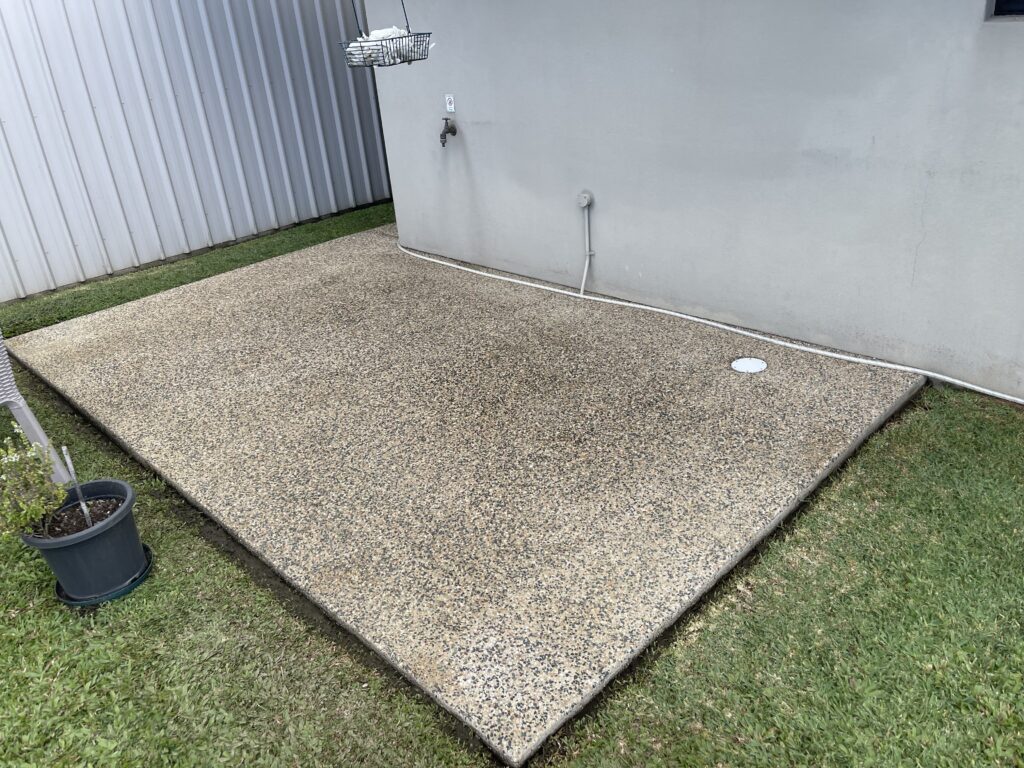 Professional pressure washing exposed aggregate Mackay