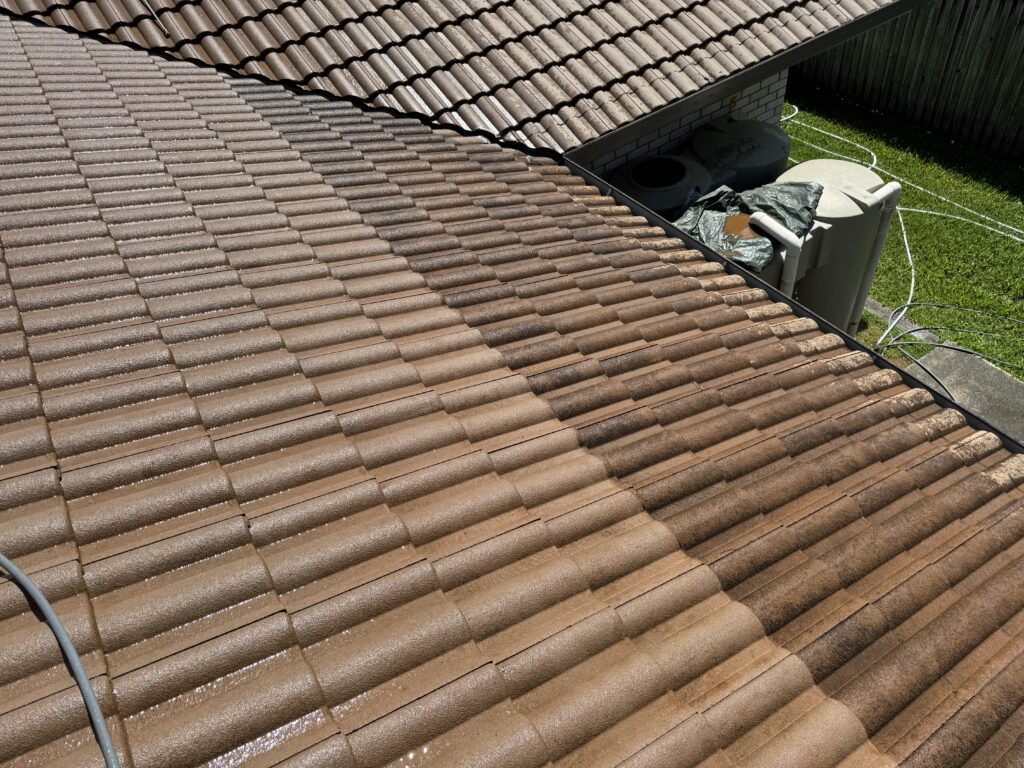 Dirty tiled roof before roof cleaning in Andergrove