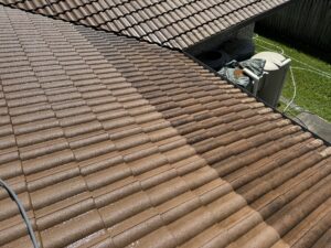 Dirty tiled roof before roof cleaning in Andergrove