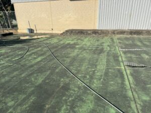 Tennis court cleaning completed at PCYC North Mackay by Pristine Washing.