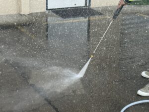 Professional pressure cleaning driveway in Andergrove Queensland