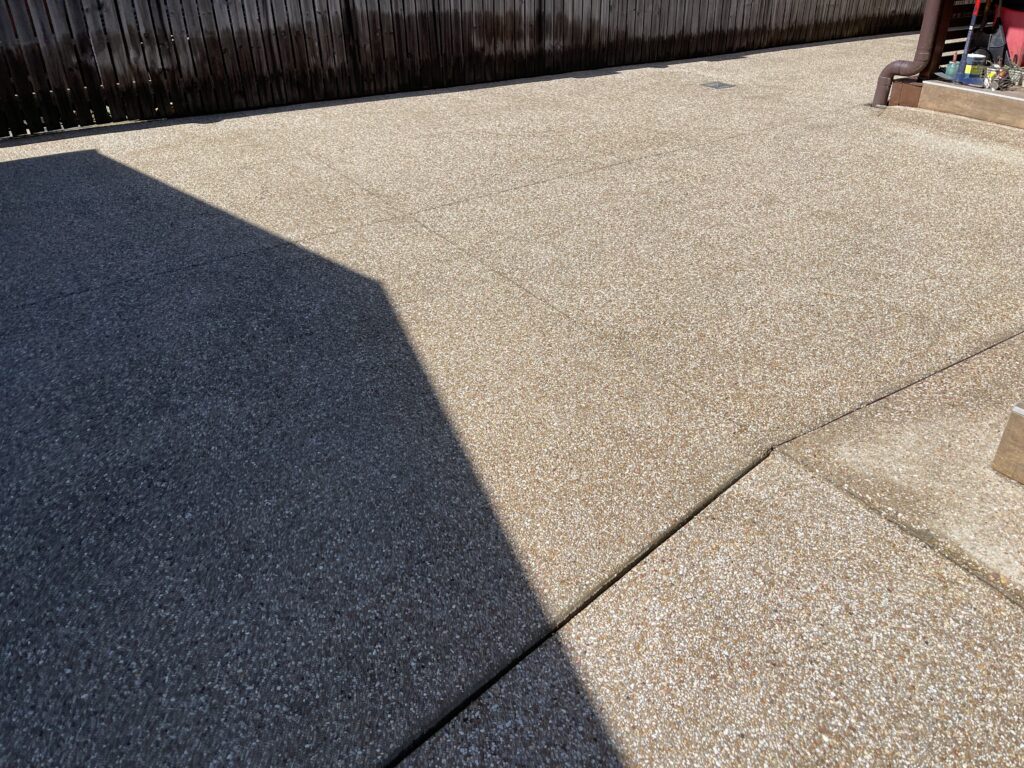 Clean exposed aggregate driveway after pressure cleaning Mackay