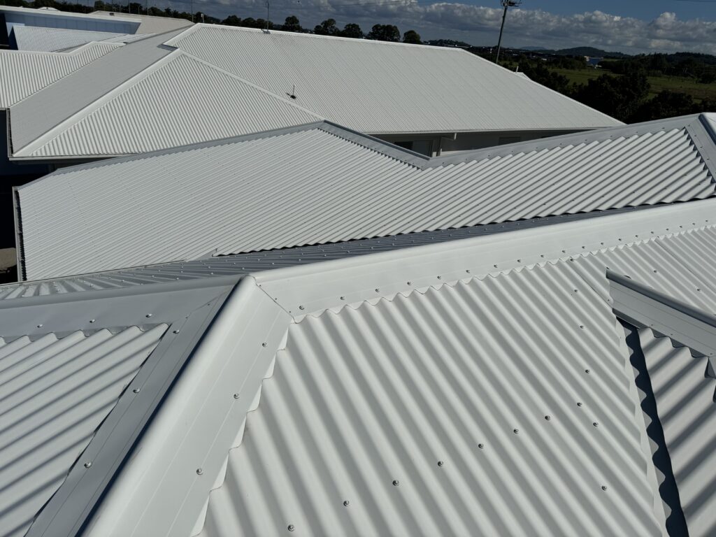 Roof cleaning Beaconsfield completed on white Colorbond roof in Mackay