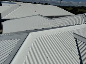 Roof cleaning Beaconsfield completed on white Colorbond roof in Mackay