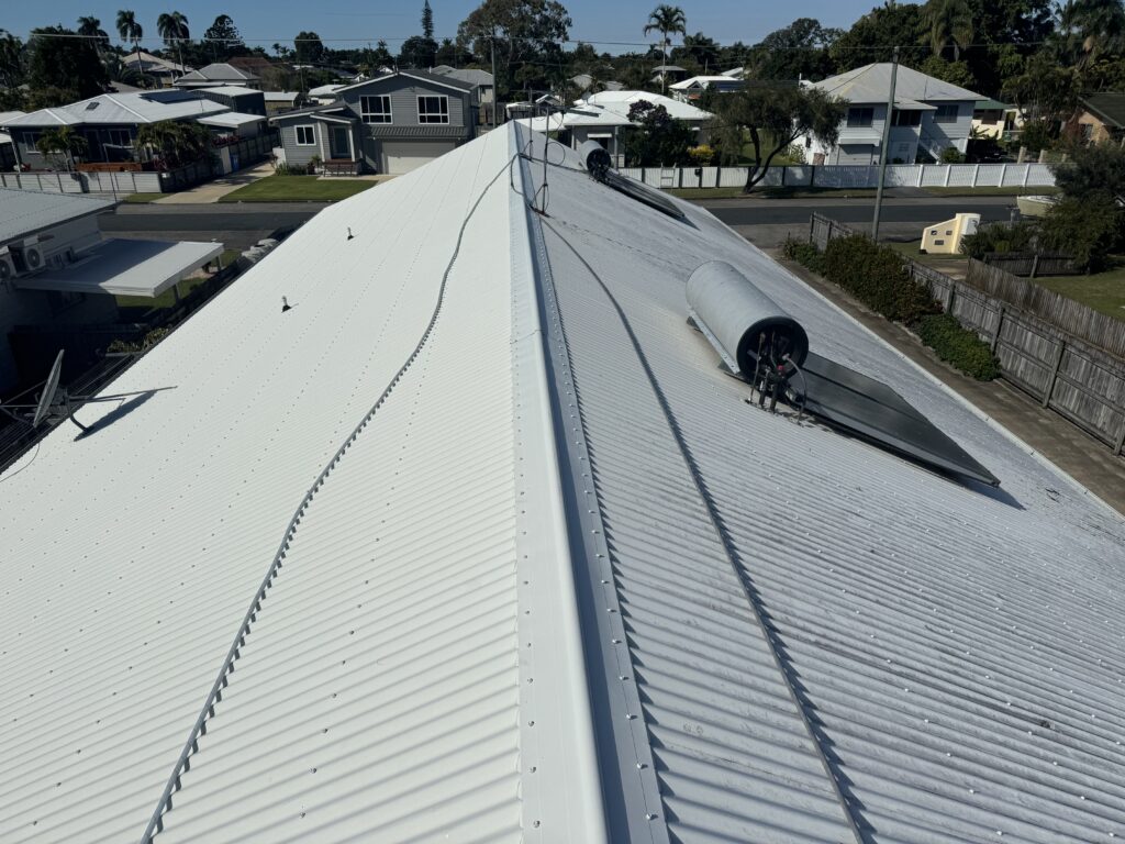 Clean white Colorbond roof after roof cleaning in East Mackay