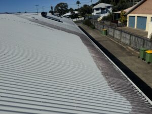 Roof cleaning process on Colorbond roof in East Mackay Mackay
