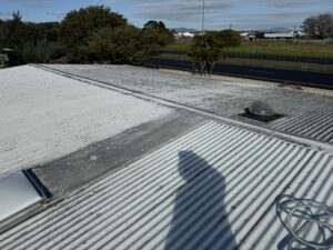 Clean white Colorbond roof after roof washing Bakers Creek