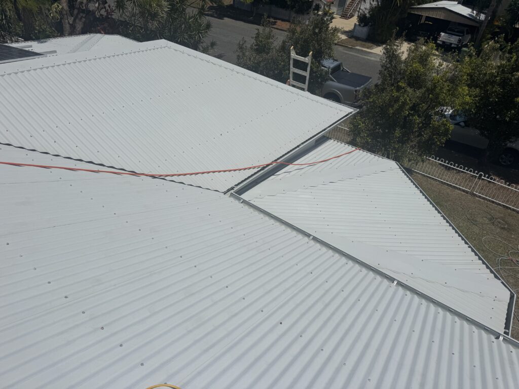 Clean Colorbond roof after professional roof cleaning in West Mackay