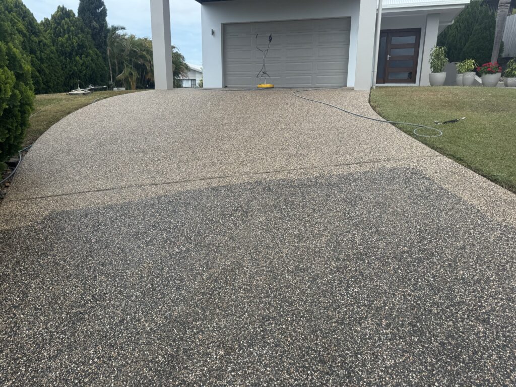 Exposed aggregate driveway cleaning transformation in Andergrove
