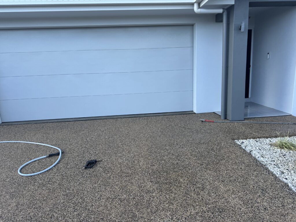 Exposed aggregate driveway cleaning in Andergrove