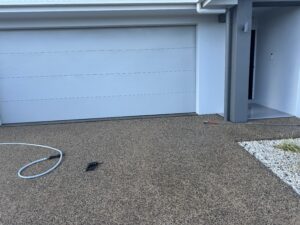 Exposed aggregate driveway cleaning in Andergrove