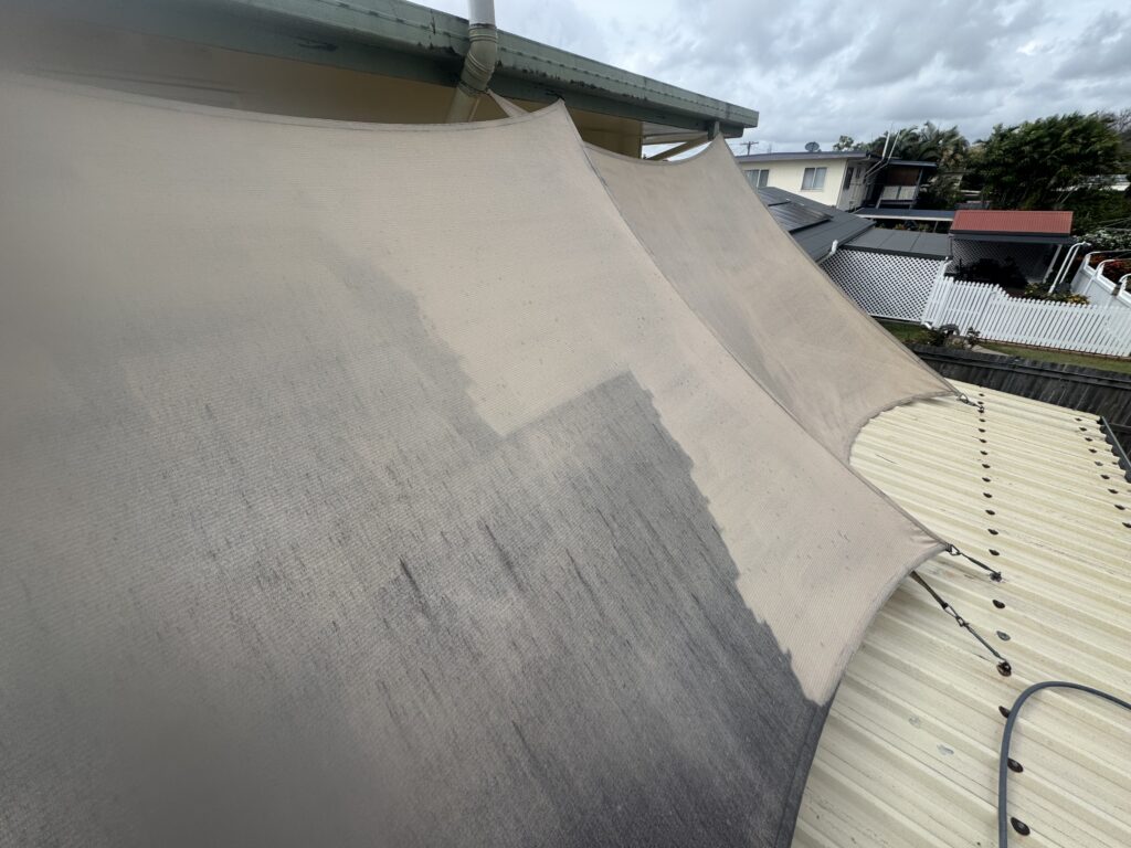 Wide view of shade sail cleaning project in South Mackay