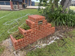 Brick letterbox pressure cleaned in West Mackay by Pristine Washing