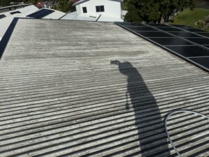 Dirty white Colorbond roof before Glenella roof cleaning in Mackay