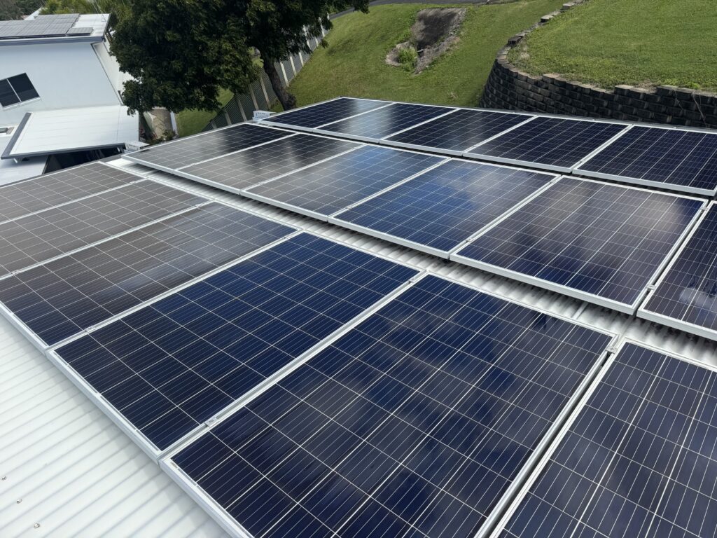 Solar panel cleaning Glenella Mackay on white Colorbond roof