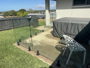 Clean glass fence panels after professional cleaning in Glenella Mackay