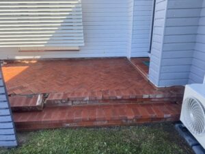 Clean brick paver entrance after pressure cleaning at Mackay City Medical