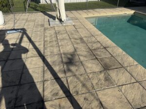 Before and after pool paver pressure cleaning in Glenella