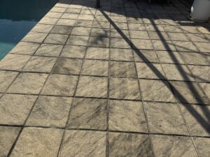Dirty pool pavers before exterior cleaning Glenella