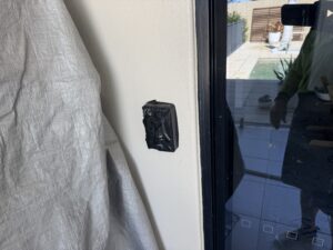 Outdoor power point taped for safety during exterior cleaning