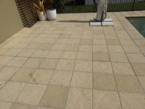 Before and after pool paver pressure cleaning in Glenella