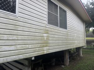 Exterior house washing project in Erakala before professional cleaning