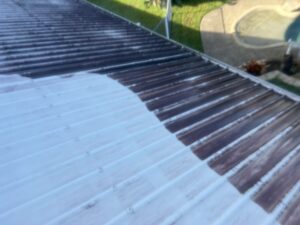 Before and after roof cleaning showing mould removal on a Glenella roof