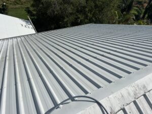 Freshly cleaned Colorbond roof after roof cleaning service in Glenella