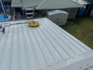 Professional Colorbond roof cleaning completed by Pristine Washing in Glenella