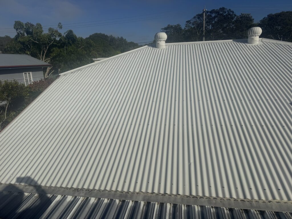Corrugated roof and ventilators, illustrating our guide to choosing the best roof cleaners in Mackay