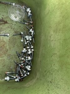 Screws found in the gutters