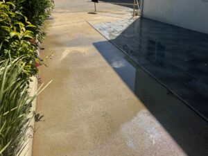 Pressure clean the concrete floors