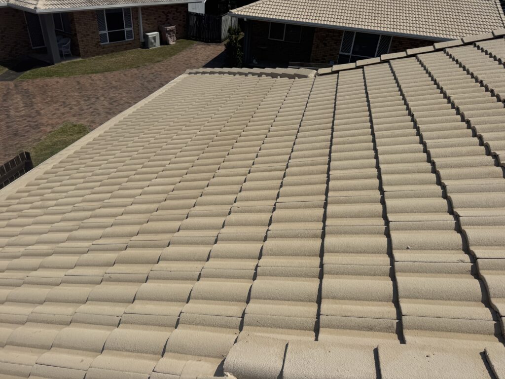 Light beige tiles after painted tile roof cleaning in West Mackay