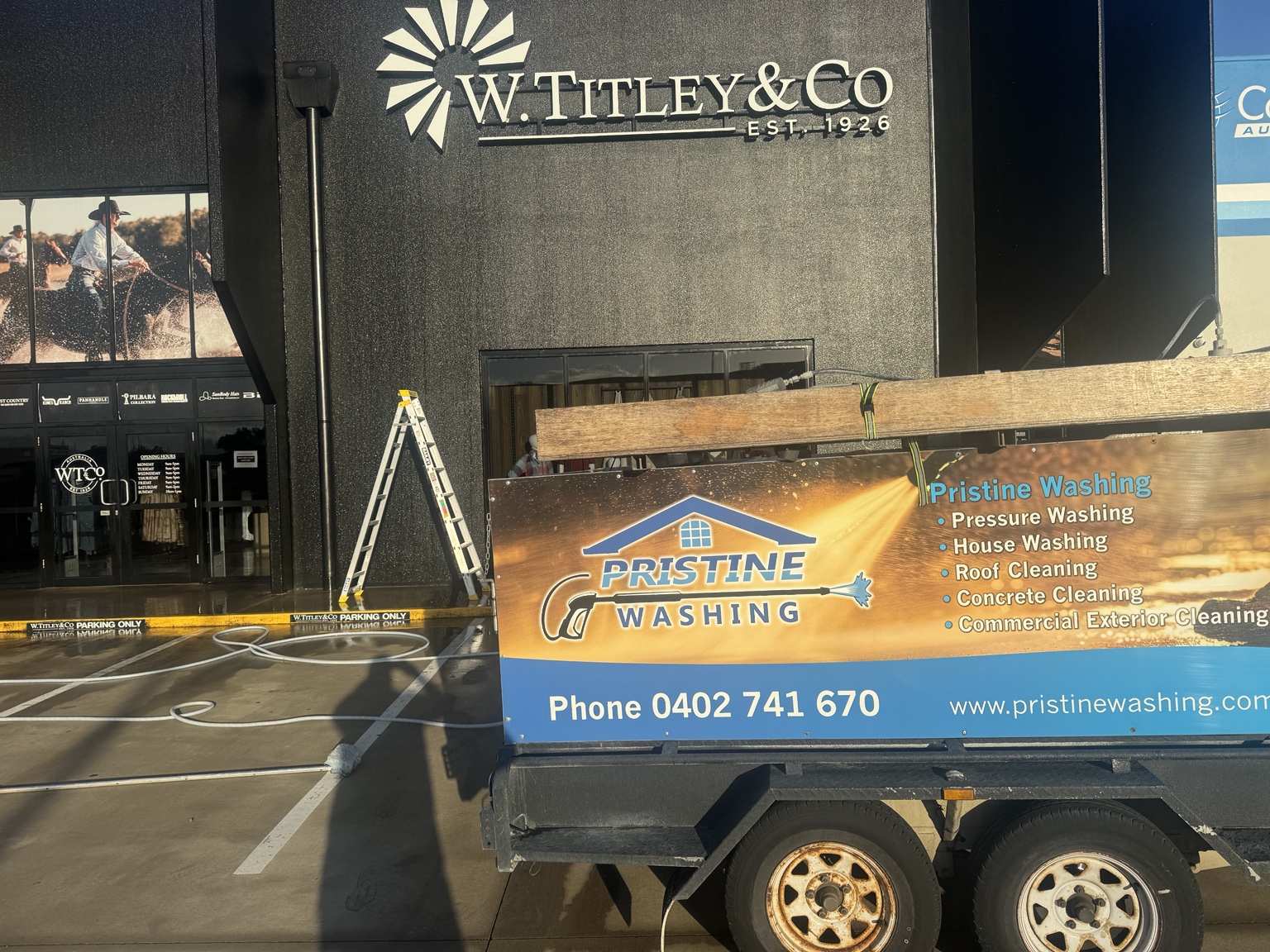 Pristine Washing trailer outside the W. Titley & Co shopfront in Mackay